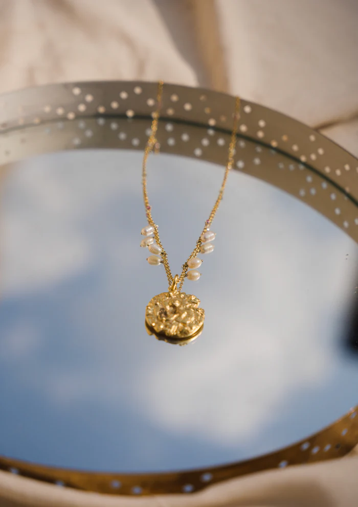 Round Textured Pendant With Pearls