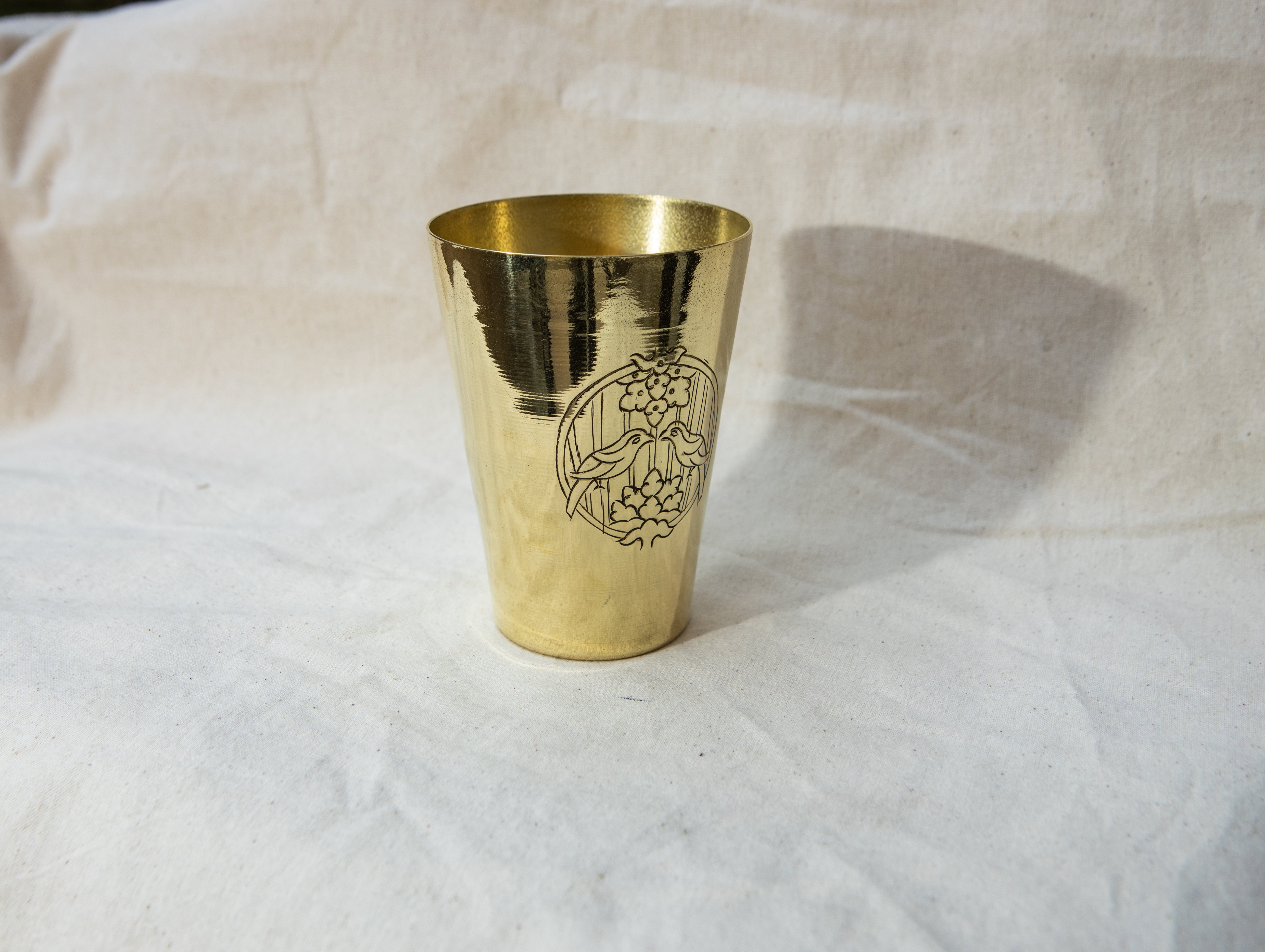 Brass Ranibari Glass